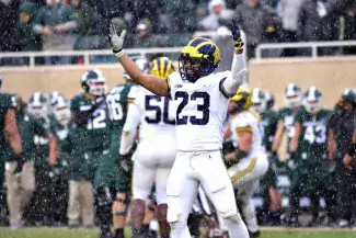 Tyree Kinnel celebrates during Michigan's win over Michigan State