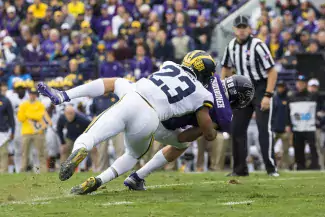 Tyree Kinnel makes a tackle against Northwestern