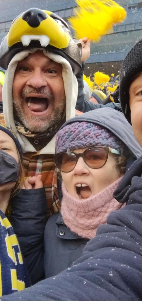 My wife and I at The Game.  I use it as my phone background.  I've re-watched The Game AT LEAST once a week since last November.