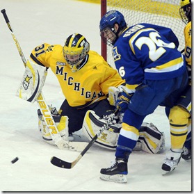 Michigan goalie Shawn Hunwick tries to keep Alaska Fairbank's Chad Gehon, right, from scoring during second period action of Saturday, Janaury 22nd's clash between the two teams at UM's Yost Ice Arena.
Lon Horwedel | AnnArbor.com
