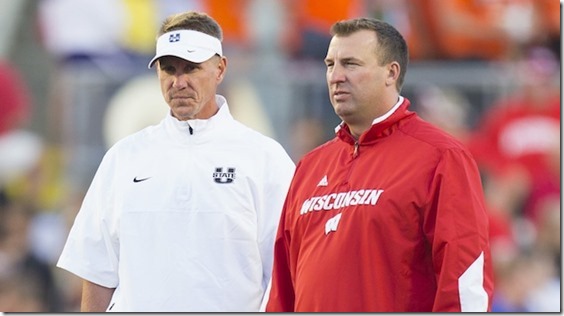 Sep 15, 2012; Madison, WI, USA;  Utah State Aggies head coach Gary Andersen (left) and Wisconsin Badgers head coach Bret Bielema (right) talk during warm-ups prior to their game at Camp Randall Stadium.  Mandatory Credit: Jeff Hanisch-USA TODAY Sports