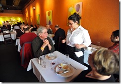 1/20/10 - David and Alisande Read of Scio Township talk to server Nicole Polidori during the Prix Fix lunch as part of Restaurant Week at Logan on W. Washington Wednesday.  (Mark Bialek for Ann Arbor.com)<br />
