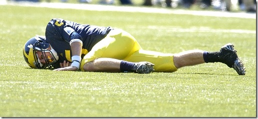 Michigan quarterback Tate Forcier grimaces in pain after being leveled during third quarter action of the Wolverine's 45-17 win over Eastern Michigan, Saturday, September 19th at Michigan Stadium. Forcier left the game briefly, but returned to action later in the contest.
Lon Horwedel | Ann Arbor.com
